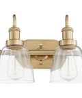 Transitional Two Light Bathroom Vanity in aged brass finish, LED compatible, clear glass shades, modern contemporary fixture