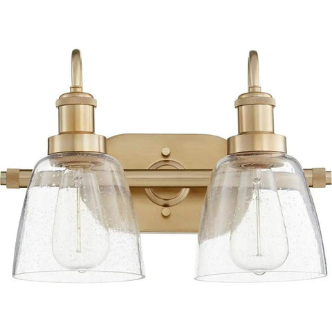 Transitional Two Light Bathroom Vanity in aged brass finish, LED compatible, clear glass shades, modern contemporary fixture