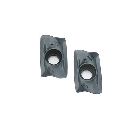 Durable Indexable Carbide Lathe Tool R390 11T308 PM For Turning Steel And Stainless, two metal cutting inserts view from above.