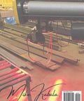 Book cover: Electrical Engineering: Acing crane & hoist; by Mike Kabala; crane hoist with spool and red straps in a workshop.