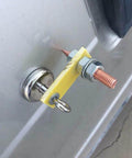 Earth Ground Connector For Auto Dent Repair And Stud Welding on metal surface, yellow easy clip grounding tool in use