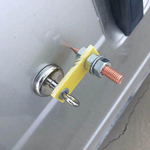 Earth Ground Connector For Auto Dent Repair And Stud Welding on metal surface, yellow easy clip grounding tool in use