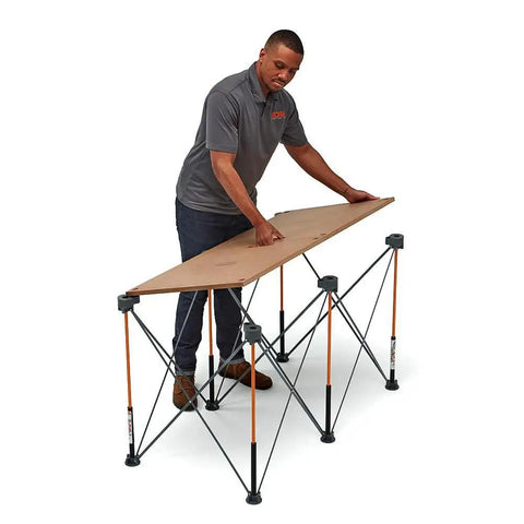 Man setting up Centipede Folding Table Top For Portable Work Stand Saw Horses, 24 Inch By 48 Inch Wood Top With 6 Quick Twist Locks