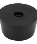 Close-up of a black rubber protector from the Non Slip Furniture Feet Pads Set For Chairs And Tables, 18 Piece Black Rubber Floor Protection Mats
