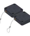 Two Pack Multifunctional Sensor Automatic Door Closer With 800G Pull Strength for Home and Office, black units with wire loops.