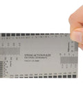 Guitar And Bass Setup Pro Tool Kit With 32 Blade Stainless Feeler Gauge String Action Ruler showing metric and imperial markings.
