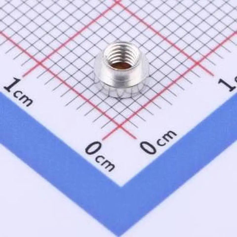 20 Pack SMD Surface Mount Round Nuts Circuit Board Hardware M3x1.5 Copper Tinned Columns on measurement grid for size reference.