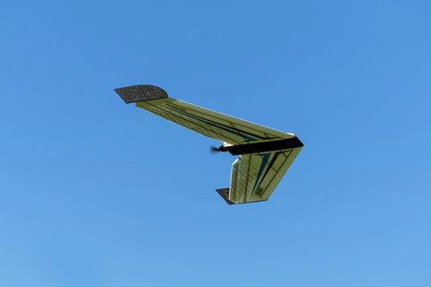 FPV Delta Wing RC Airplane Kit With 1114mm Wingspan EPP Foam Build flying against clear blue sky.