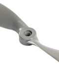 Close-up of gray 2 Vane Direct Drive Nylon RC Propeller Set with Adapter Rings for Airplanes Drones Gliders, CW and CCW, 12x6 size