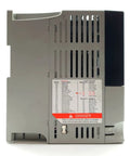 Powerful 1.5 KW 240V Three Phase Variable Frequency Drive For Precise Motor Control Smooth Speed Regulation And Industrial AC Performance A True Workhorse For Reliable Efficient Motor Runs, gray metal VFD side view with vent slots and warning label