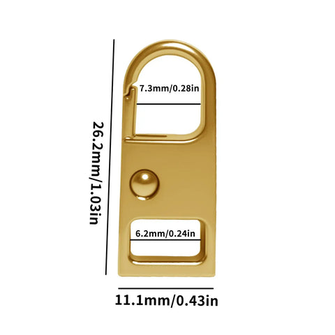 Close-up of a gold zipper pull tab from Eleven Pieces Zipper Pull Replacement Set Heavy Duty Metal Zipper Repair Kit Detachable Pull Tabs For Purses Luggage Backpacks Jackets Coats Boots Zip Fixer In Black Silver Gold Gunblack Bronze No Fuss.