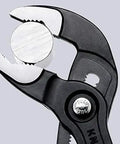 Cobra Water Pump Pliers 7 And A Quarter Inch Beefy Self Locking Pliers gripping metal pipe close-up