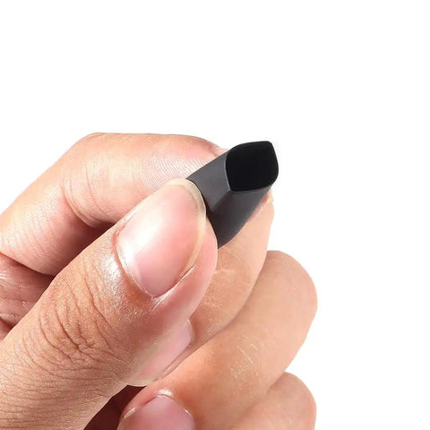 Close-up of a hand holding black tubing from 127 Piece Heat Shrink Tubing Set With 2 To 1 Shrink Ratio Assorted Black And Red Tubing In 7 Sizes
