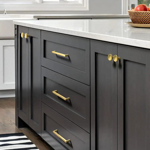 Six Pack Heavy Duty Pure Brass Cabinet Pulls With Matte Brushed Finish 5 Inch Center To Center mounted on dark kitchen cabinets.