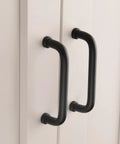 Five Pack Matte Black Modern Cabinet Pulls 3.75 Inch Hole Center 96mm Dresser Drawer Cupboard Handles mounted on white door