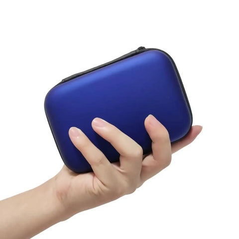 Hand holding compact blue case for Snake Bite And Sting First Aid Kit For Hiking And Camping With Venom Extractor Suction Pump