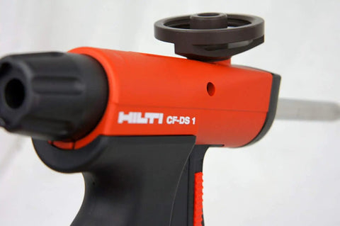 Deluxe Foam Insulating Sealant Dispenser CF-DS1, side view showing smooth trigger and orange-black design for easy application.