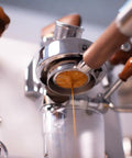 Bottomless 58mm Portafilter for E61 Grouphead Espresso Machines Pro Grade Naked Portafilter With Stainless Steel Body And Zebra Wood Handle Includes Filter Basket extracting espresso shot