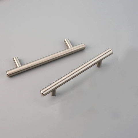 Brushed Nickel Stainless Steel Cabinet Pulls 6 Inch Overall Length With Four Inch Hole Centers And Half Inch Projection, pair on grey