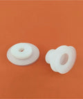 Built Like A Tank Double Industrial Vacuum Suction Cup With Automatic Chuck For Robotic Manipulators And No Sweat Production Line Work Gets Done Right In Dp Four Five Pack, two white plastic grippers on orange background.