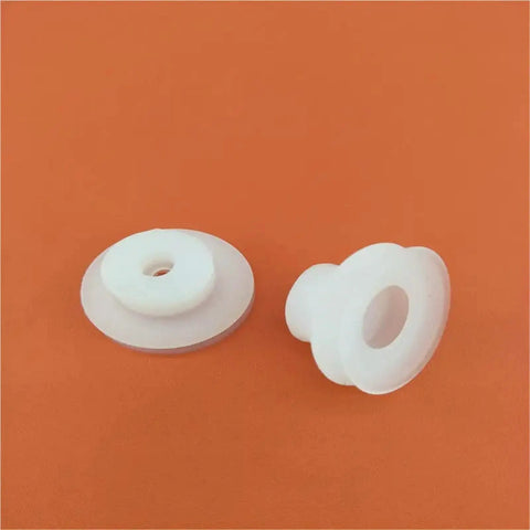 Built Like A Tank Double Industrial Vacuum Suction Cup With Automatic Chuck For Robotic Manipulators And No Sweat Production Line Work Gets Done Right In Dp Four Five Pack, two white plastic grippers on orange background.