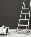 High Velocity Air Mover Super Fan Max One Fifth Horsepower For Fast Room Cooling next to a ladder on gray background
