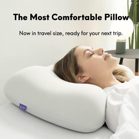 Woman resting on Compact Travel Memory Foam Neck Pillow For Deep Sleep On The Go Ideal For Hotels Camping And Side Or Back Sleepers Ultra Plush Portable Wellness Green
