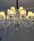 Modern Crystal Ceiling Pendant Light With Polished Chrome Frame And E14 Bulb Socket For Killer Kitchen Island Ambiance Or Cozy Living Room Glow That Truly Slaps Vibe Upward, featuring multiple lampshades and crystal accents.