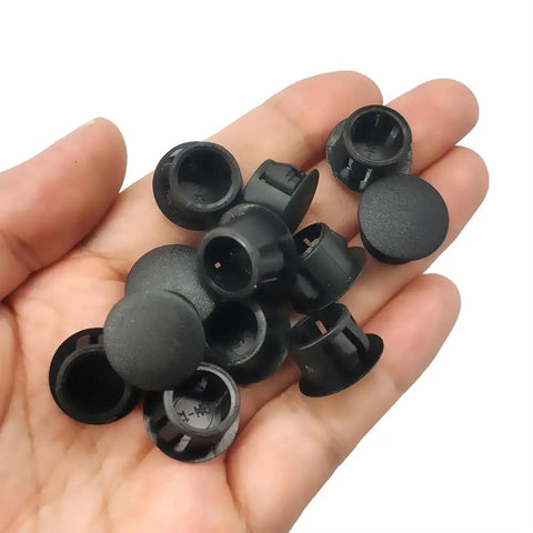 Half Inch Plastic Hole Plugs Flush Snap In Locking Caps For Cabinets Furniture Shelves Bookcases Closets And Woodworking Holes Drilling Covers Screw Hole Plugs Black 50 Pack Easy Fit Seamless Finish No Tools Needed in hand