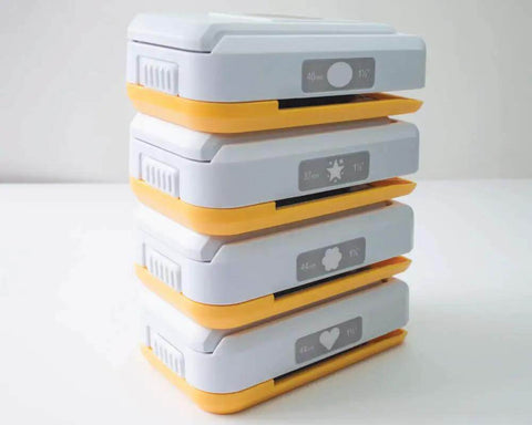 Stacked SlimLock Large Oval Punch 40mm By 30mm for scrapbooking, card making, with upside-down alignment and compact storage design.