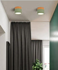 7W LED Recessed Downlight in green color illuminating a modern room with curtains, showcasing decorative ceiling accent.