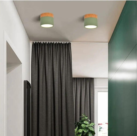 7W LED Recessed Downlight in green color illuminating a modern room with curtains, showcasing decorative ceiling accent.