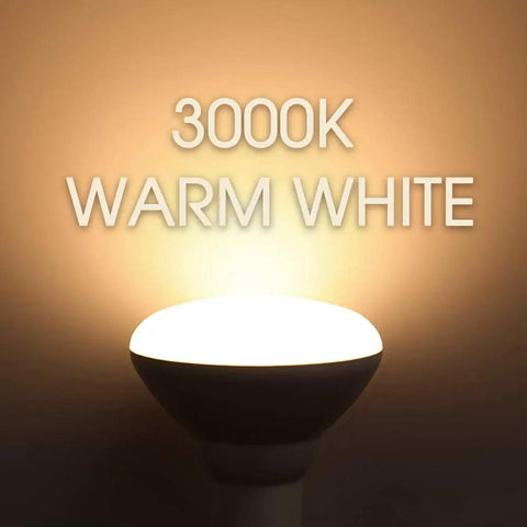 BR30 LED Recessed Light Bulbs 65W Equivalent Dimmable Warm White 3000K glow against a wall, emphasizing warm lighting.