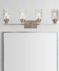 4 Light Vanity Light Fixtures For Bathroom With Brushed Nickel Finish And Hammered Glass Shades above mirror