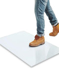 Keep The Floors Spotless With Heavy Duty Tacky Mats 24 By 36 Inches White Adhesive Roll Out Sheets under a boot for dust control.