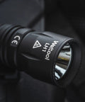 Close-up of LH1 V2 LED White Light Head With Single Mode Throwing Beam for Tactical Weapon Lights in black finish.