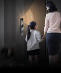 Slick Smart Door Lock Featuring Built In Camera Voice Intercom And Fast Fingerprint Scan Password Entry Along With Hella Secure Auto Deadbolt Delivering Darn Top Shelf Protection Always on entrance door with mother and daughter.