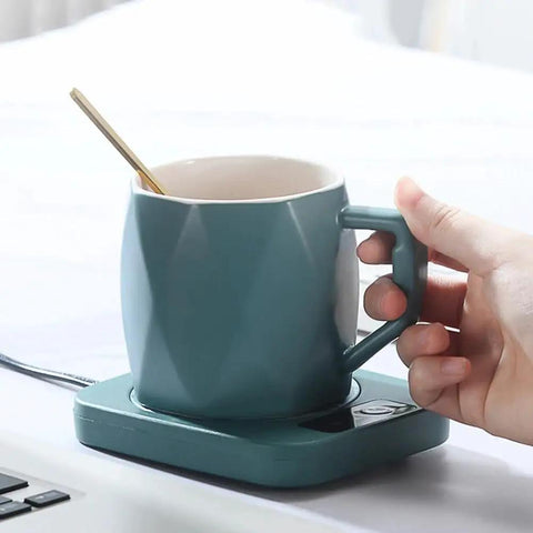 Smart Electric Cup Warmer Keeps Your Daily Coffee Brew Toasty With Rapid Heat Plate And Steady Temperature Lock designed for a teal mug.
