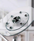 Glass Lazy Susan Turntable For Kitchen And Dining Table Featuring A Smooth Operator Spin with chrome support and clear glass surface.