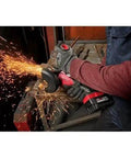 Top Shelf Brushless M18 Compatible Angle Grinder Kit Ships Loaded In Rugged Contractor Bag Featuring Smart Charge Sync And Beast Mode Torque For Serious Crews Jobsite in action, sparks flying off metal.