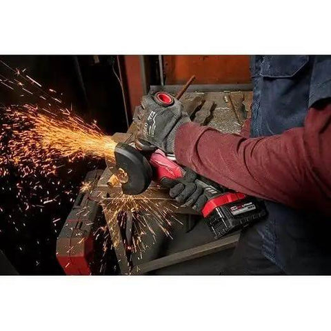 Top Shelf Brushless M18 Compatible Angle Grinder Kit Ships Loaded In Rugged Contractor Bag Featuring Smart Charge Sync And Beast Mode Torque For Serious Crews Jobsite in action, sparks flying off metal.