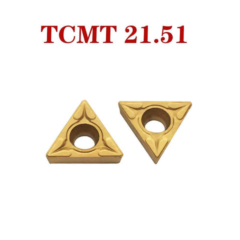 Two gold carbide turning inserts TCMT21.51 with center hole, triangular shape, front view