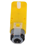 Yellow DC motor for omnidirectional wheel set for DIY smart cars with 48mm rubber coated left right wheels, front view.