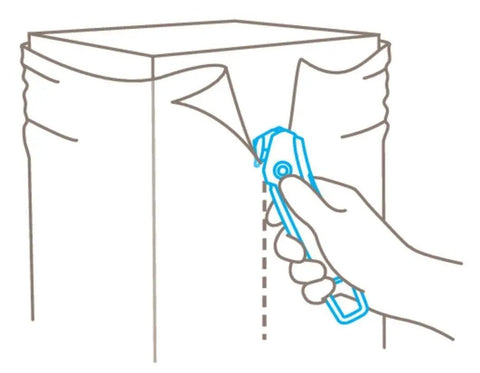 Illustration of a hand using a Concealed Blade Safety Cutter for box tape and shrink wrap on a cardboard box