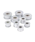 Precision 16 Tooth HTD Smooth Timing Idler Pulley Pack Of 5 With A Snug 7mm Bore And Slick 16mm Outer Diameter displayed in various sizes.