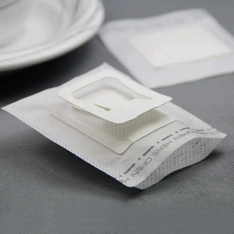 Close-up of 50 Pack Portable Coffee Filter Bags With Hanging Ear for quick single serve drip coffee, on a table