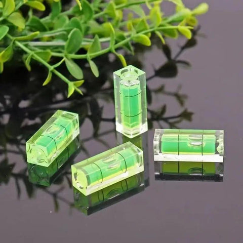 Eleven Piece Mini Picture Hanging Level Featuring Precision Spirit Bubble And Quick Measure Grids For Straight Up No Sweat Wall Art Framing Or Shelf Mounting Setup In Compact Green Pmma Design
