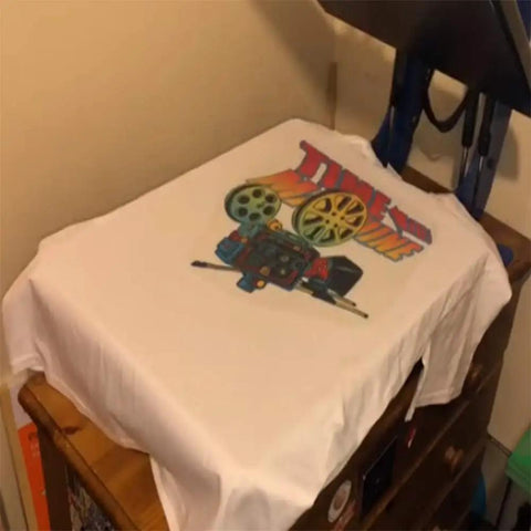 T-shirt with colorful film reel design using Matte White PU Heat Transfer Vinyl Roll 24x50ft for all color tees