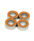 10 Piece Slick Hybrid Ceramic Ball Bearings SMR148C 8x14x4mm Abec 7 Shielded Rings, four ceramic bearings with orange rings.