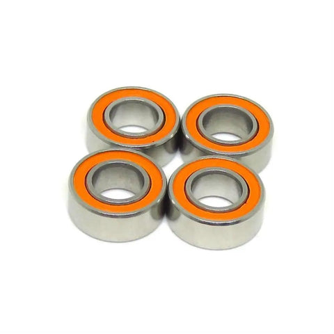 10 Piece Slick Hybrid Ceramic Ball Bearings SMR148C 8x14x4mm Abec 7 Shielded Rings, four ceramic bearings with orange rings.